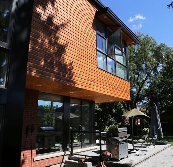 Cantilevered cedar addition
